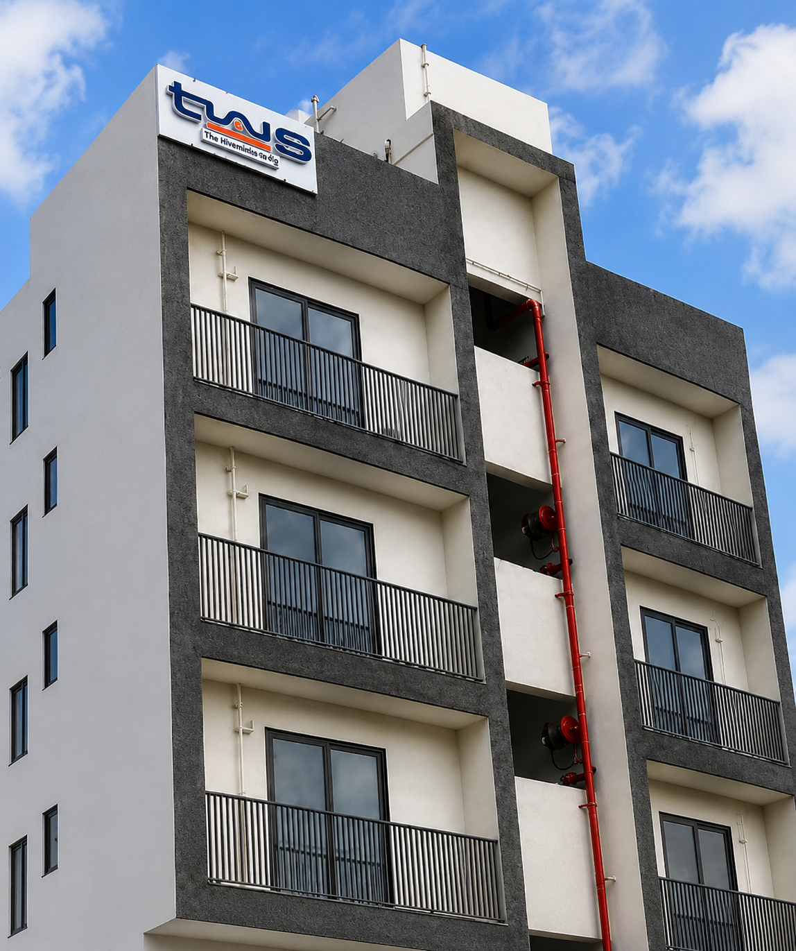 Exterior of the Whitestone PG building with balconies